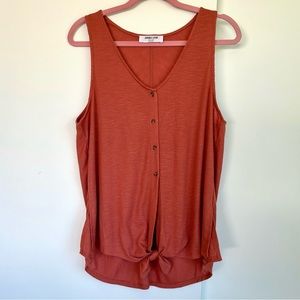rust sleeveless top with tie bottom